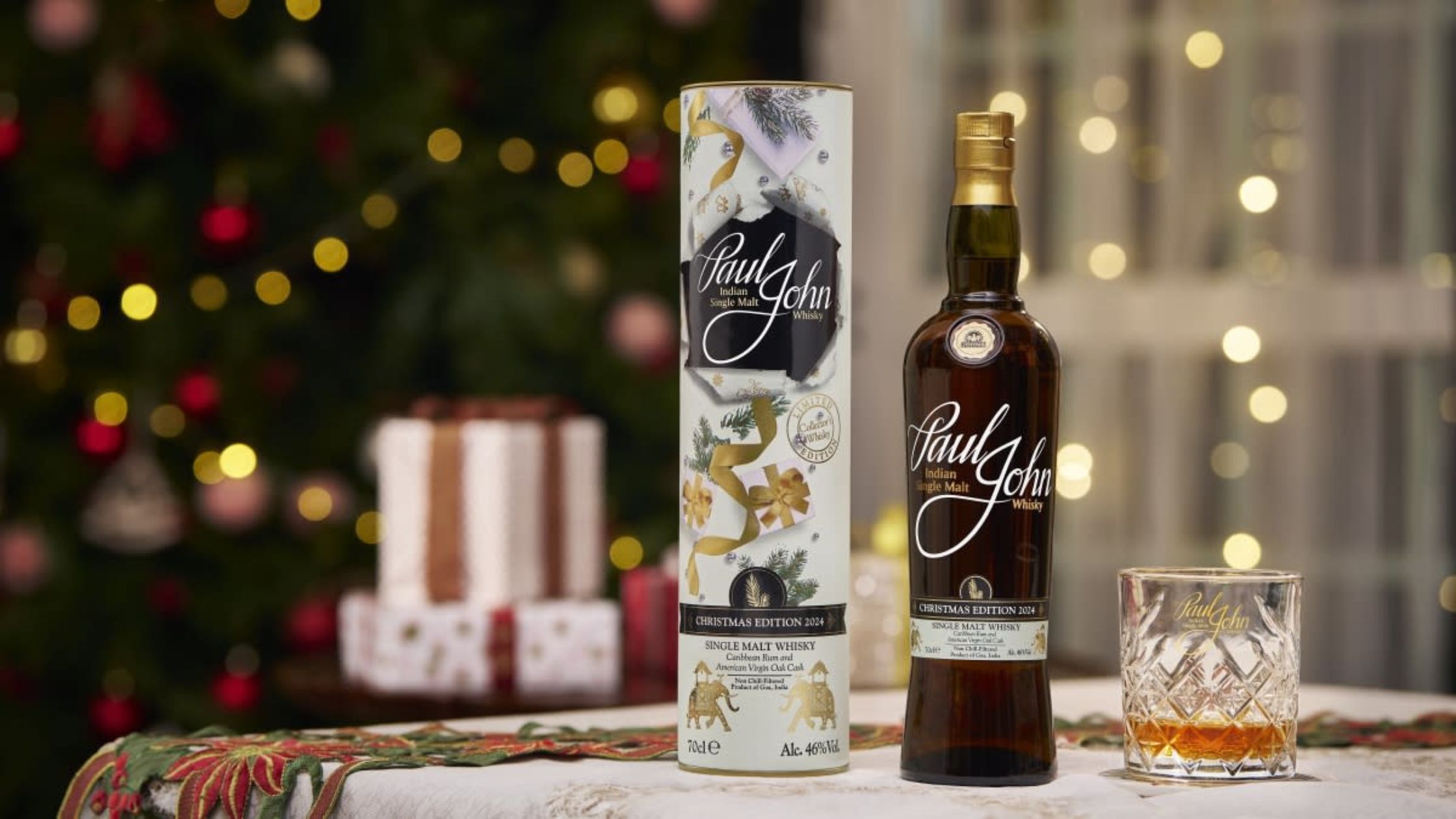 taste of paul john with branded bottle winewhiskyworld